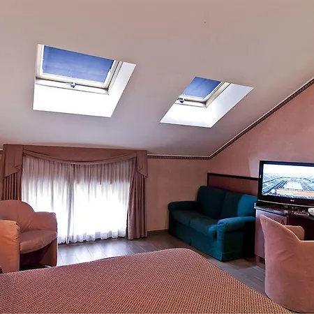 Отель Ih Puccini 4*